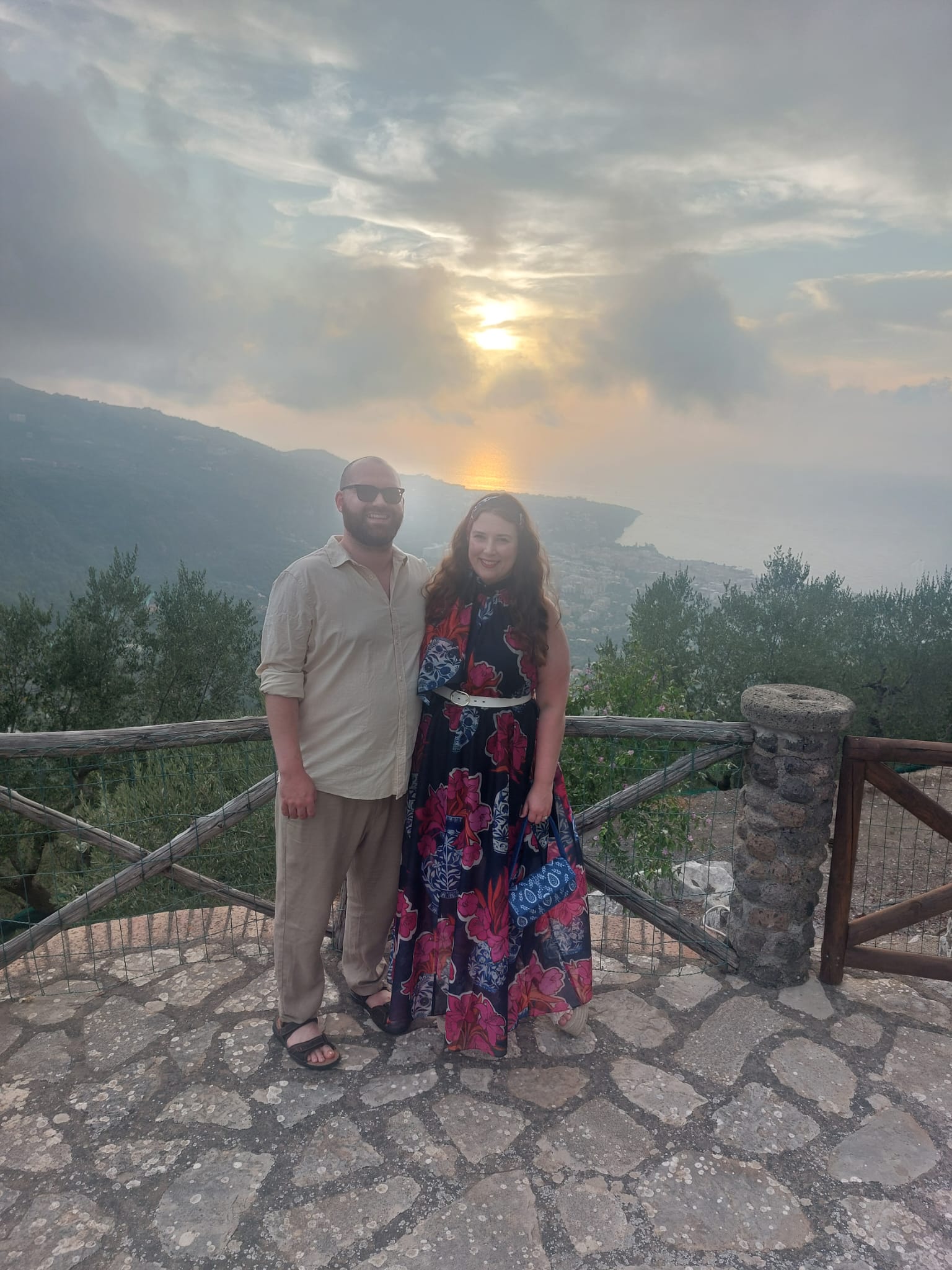Laura & Bob dressed casual overlooking hilly Sorrento area